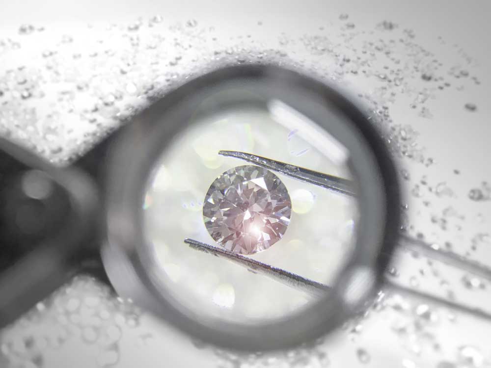 Diamond under magnifying loupe